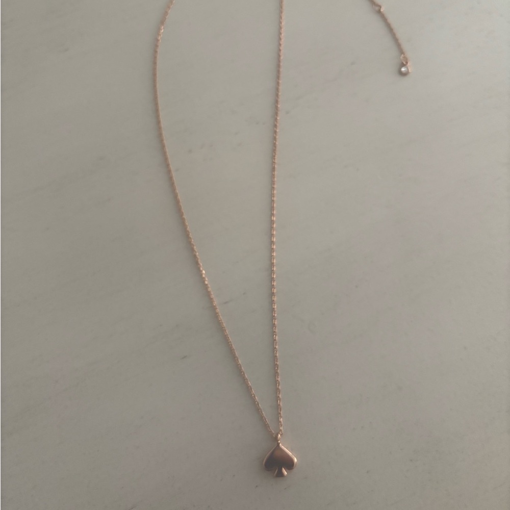 Kate Spade rose gold logo necklace